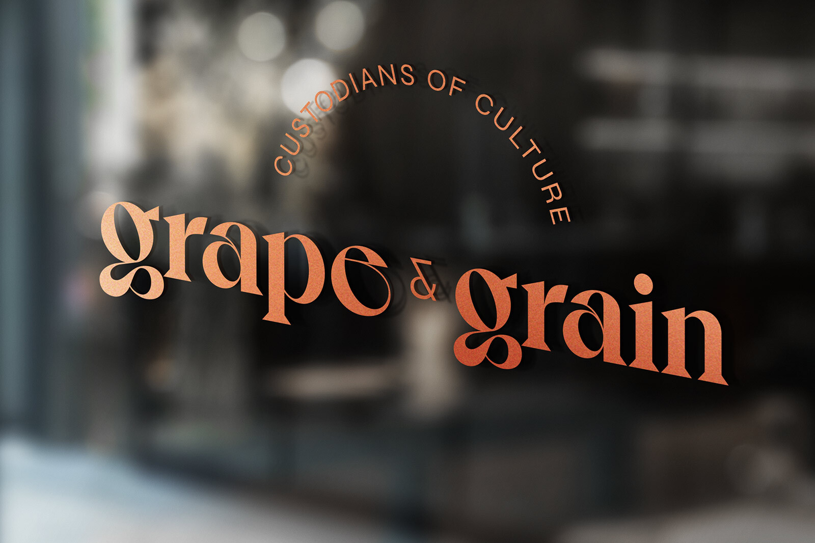 Logo auf dem Schaufenster von Grape & Grain