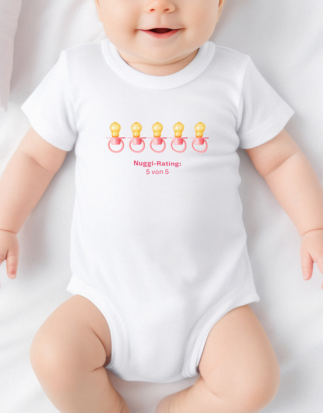 Baby mit Strampler «Nuggi-Rating 5 von 5»